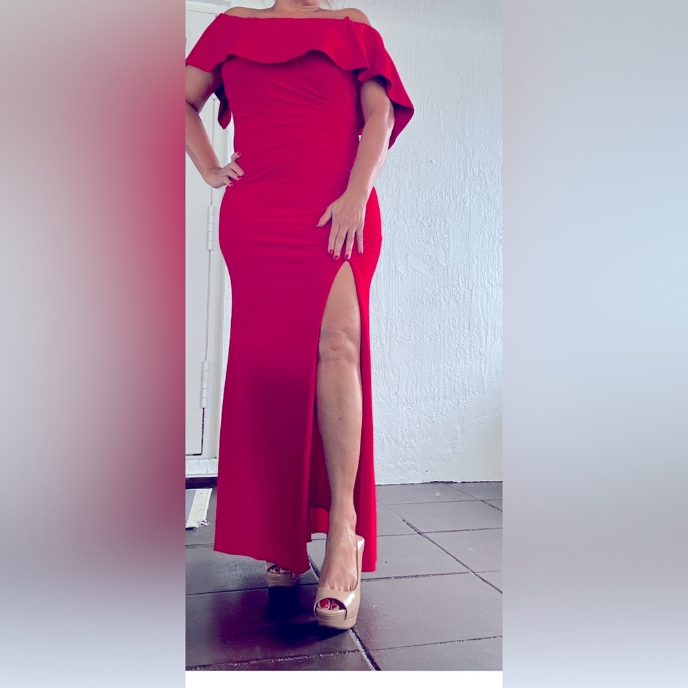 Xscape Long  formal red dress open shoulder. Size 12. In very good condition.
